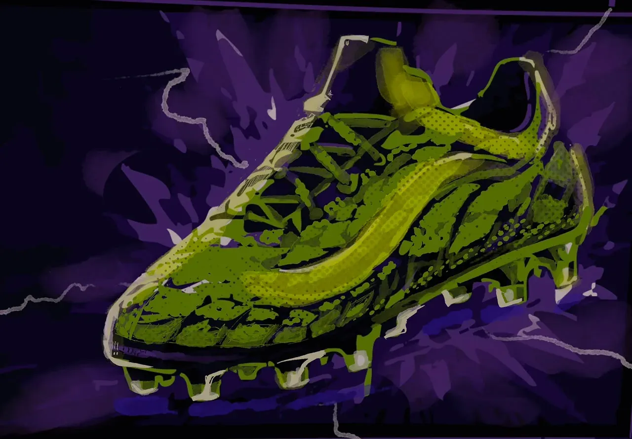 The finished mantis football boot, glowing green